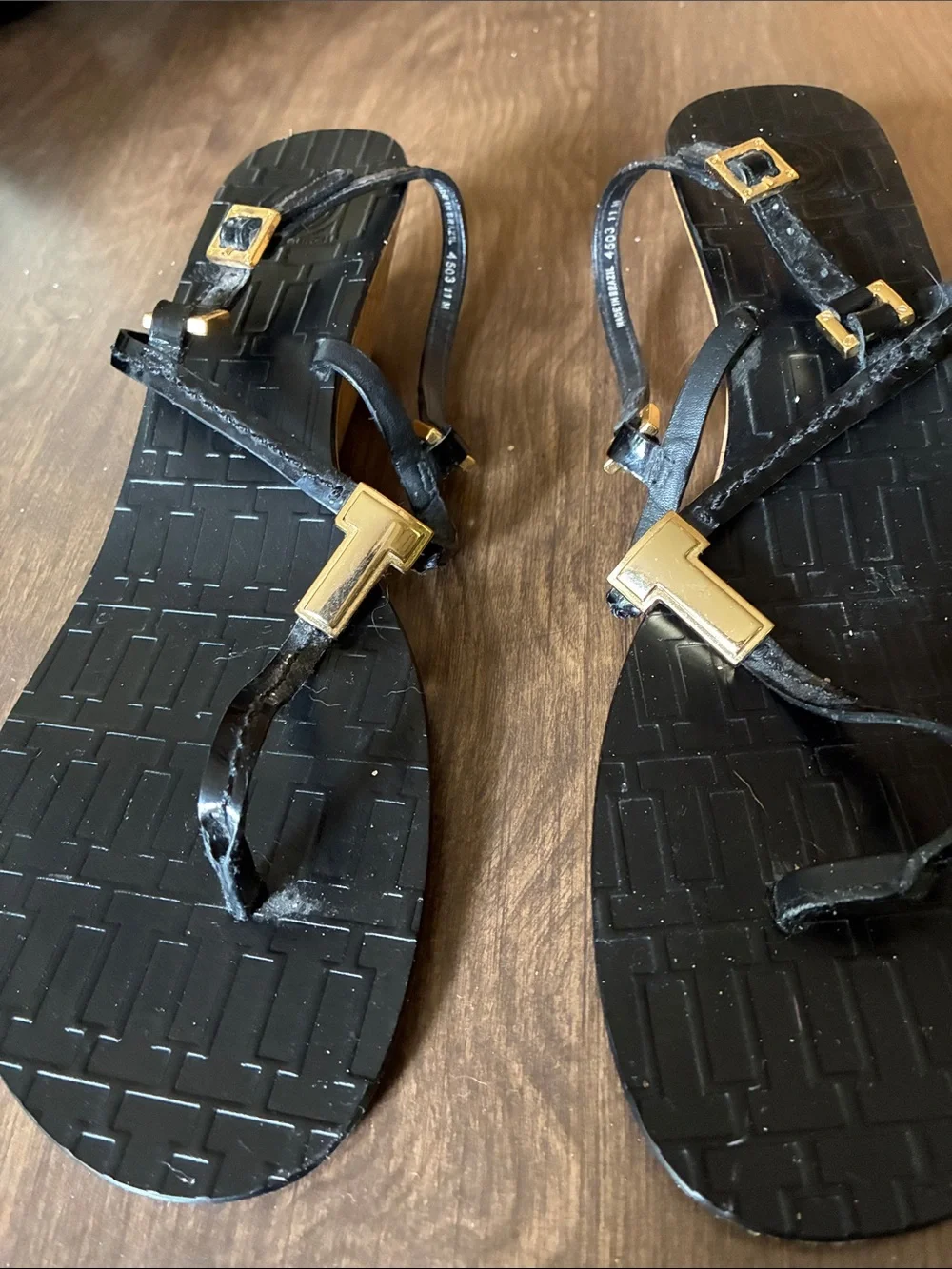 Tory Burch Black T-Strap Sandals with Gold Logo Accents